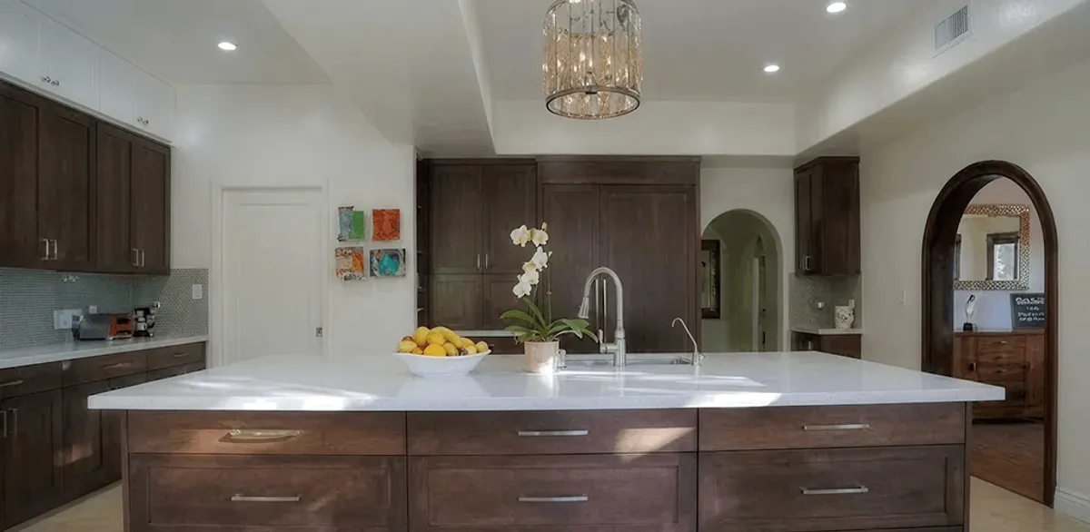 Cabinet refacing project with updated kitchen cabinets and island in Cedar Rapids, IA